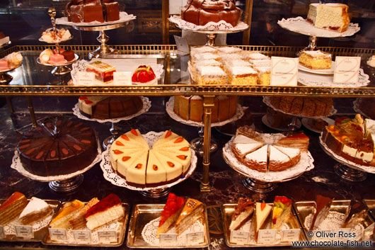 chessecakes shelf with full of uniqe flavor like carrot cake, blueberry, strawberry,redvelvet,matcha and classic